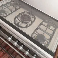 اجاق گاز فر دار تمام استیل مدل سینجر