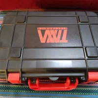 TNM 7000