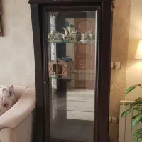 ویترین (بوفه) چوبی به همراه مجسه کالسکه