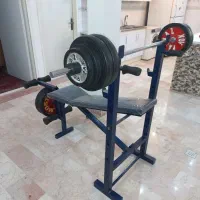 میز بدنسازی چند کاره به همراه وزنه و هالتر