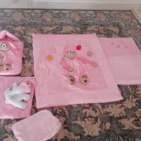 لحاف تشک نوزادی نو فقط برای عکس گرفتن باز شده