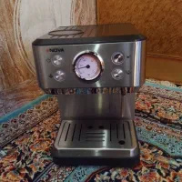 دستگاه اسپرسو نوا خونگی و ویترین مغازه