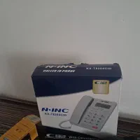 یک عدد تلفن رو میزی