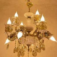 لوستر دوگل واژگون ۸شاخه ۱۲ شعله سرامیکی برنجی