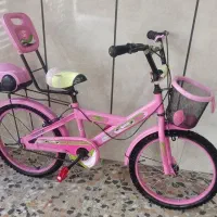 دوچرخه 20 دخترونه صورتی در حد نو