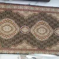 یک فرش ماهی تارا