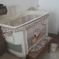 تخت نوزادی کرمی