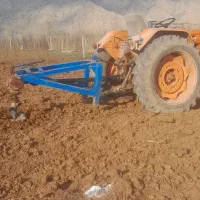 چاله کن درخت پشت تراکتور ی|خدمات باغبانی و درختکاری|خرمآباد, |دیوار