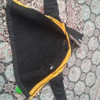 کاپشن|لباس|تربت‌حیدریه, باغ سلطانی|دیوار