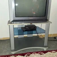 تلویزیون بهمراه میز و گیرنده دیجیتال
