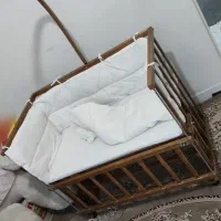 تخت ننو کنار مادر