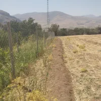 زمین مرغوب درجه بغل روستاوکتارجاده اصلی