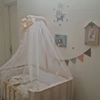 گهواره کنار تخت مادر