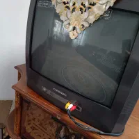 میز تلویزیون و تلویزیون هردو باهم