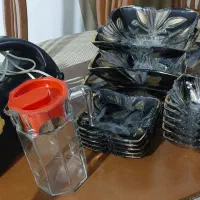 تعدادی وسایل آشپز خانه سرویس پذیرایی پارچ چرخ گوشت