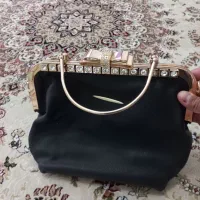 چهار تا عینک زنانه و کیف مجلسی