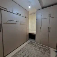 تخت تاشو با کمد دیواری