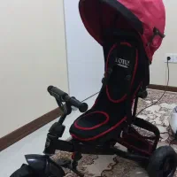 سه چرخه قرمز مشکی