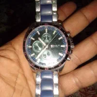 ساعتESPRIT سه موتوره فقط درب پشت نداره