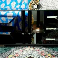 میز تلویزیون شیشه ای