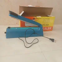 دستگاه پرس وبسته بندی آجیل کلوچه کیک