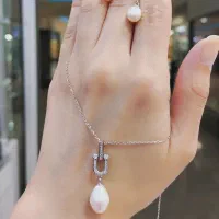 نیم‌ست و گردنبند نقره مرواریدی