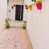 ویلایی-90-متری-بازسازی-شده-چهارباغ-باغ-باغچه