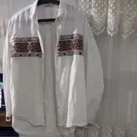 تعدادی لباس در حد نو