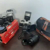 فروش دوربین عکاسی cosina و اولمپیا قدیمی و۲ فلش
