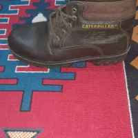 پوتین|کیف، کفش، کمربند|میانه, |دیوار