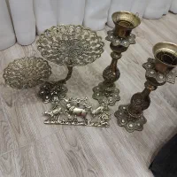 شیرینی خوری و جاکلیدی و شمعدانی هر سه برنج هستن