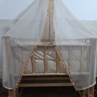 گهواره نوازد آک