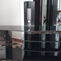 حراج میز تلویزیون شیشه ای تمیز