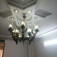 لوستر ۱۲ شاخه برنج و ساعت ایستاده برنج