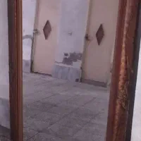 آینه با قاب منبت کاری شده