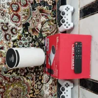 پروژکتور به همراه کنسول بازی