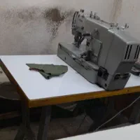 خیاطی دکمه مادگی زن نیازمندیم