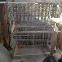 قفس دو طبقه ومرغ لاری