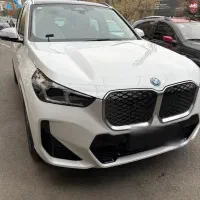 bmw iX1 2025 داخل قرمر