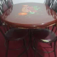 میز نهارخوری ۶ نفره صندلی ها فلز روش چوب