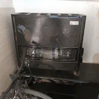 بخاری ومیز تلوزیون