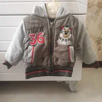 کاپشن و تعدادی لباس و کفش پسرانه