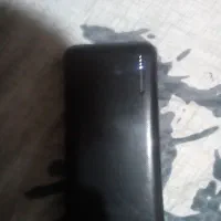 پاور بانک ۱۰۰۰۰هزارویریتی بادونوع شارژر ودوخروجی