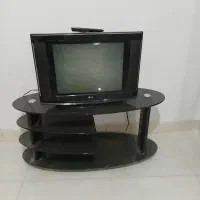 تلویزیون و میز زیر تلویزیون