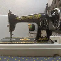 چرخ خیاطی مرد پرنده