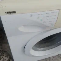 لباسشویی اتومات اسنوا میز ساعت کمد