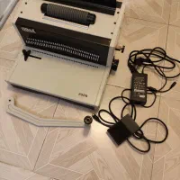 دستگاه صحافی (فنرزن ) و منگنه وسط زن در حد نو