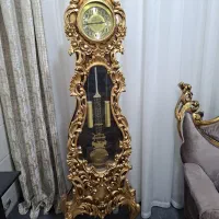 ساعت ویترین و آینه و شمعدان