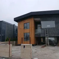 نصب چوب ترمو نما ساختمان سازنده پله گرد با پلی وود|خدمات پیشه و مهارت|رشت, منظریه|دیوار