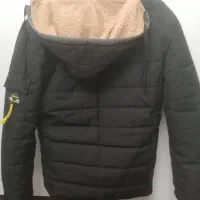 کاپشن|لباس|تربت‌حیدریه, مظفریه|دیوار